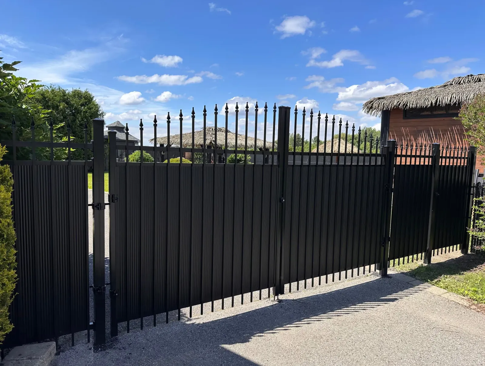 Ornamental fence with PVC privacy panels